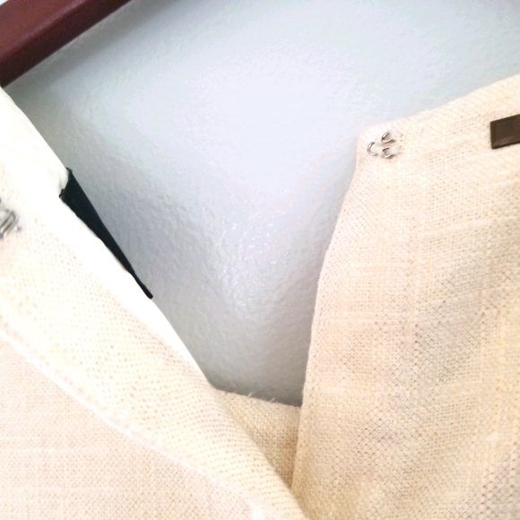 Sleeveless creme-colored dress with back detail - Picture 3 of 5